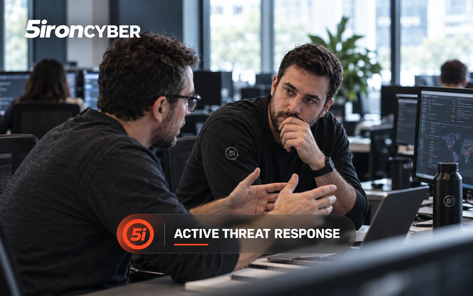 5ironCyber active threat response presentation with two security specialists discussing their work.